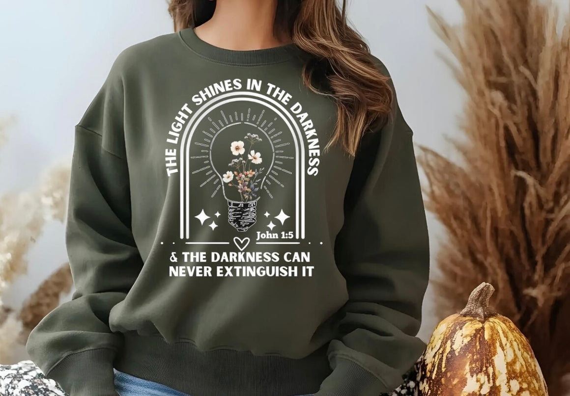 The Light Shines In The Darkness Crewneck